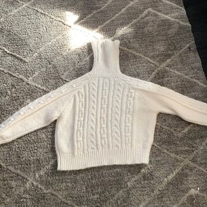 soft wool turtleneck that has never been worn.